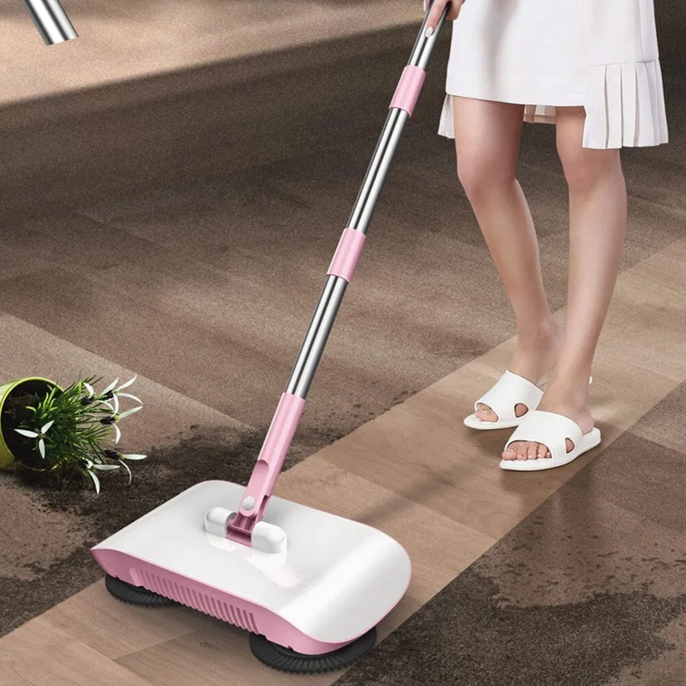 Pink hand push sweeper with rotating brush and mop attachment on tiled floor