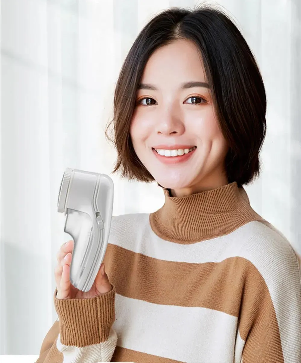 White lint remover machine with USB charging, 4W motor, 500mAh battery, 250g weight