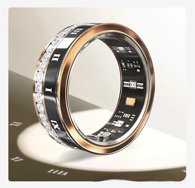Gold and silver diamond inlaid smart ring for health and blood oxygen tracking on a finger.