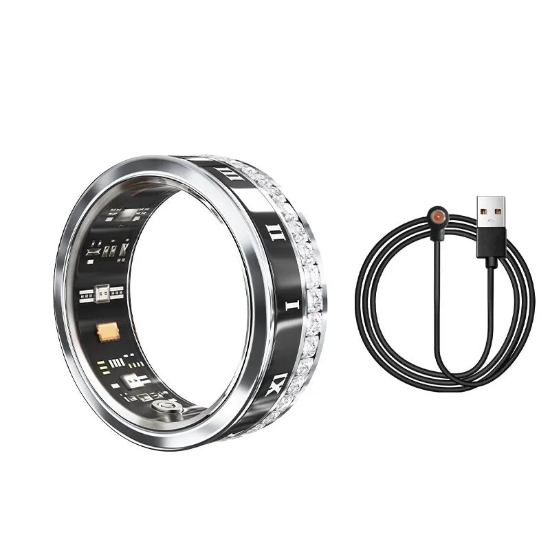 Gold and silver diamond inlaid smart ring for health and blood oxygen tracking on a finger.