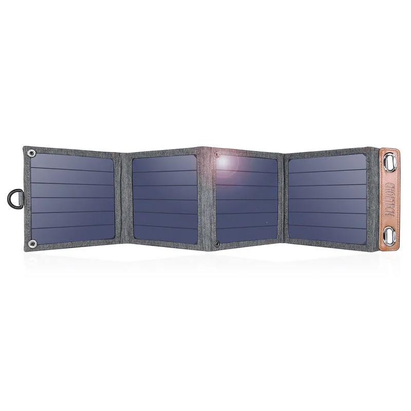 Grey foldable solar charger with USB port for mobile phone and tablet charging outdoors