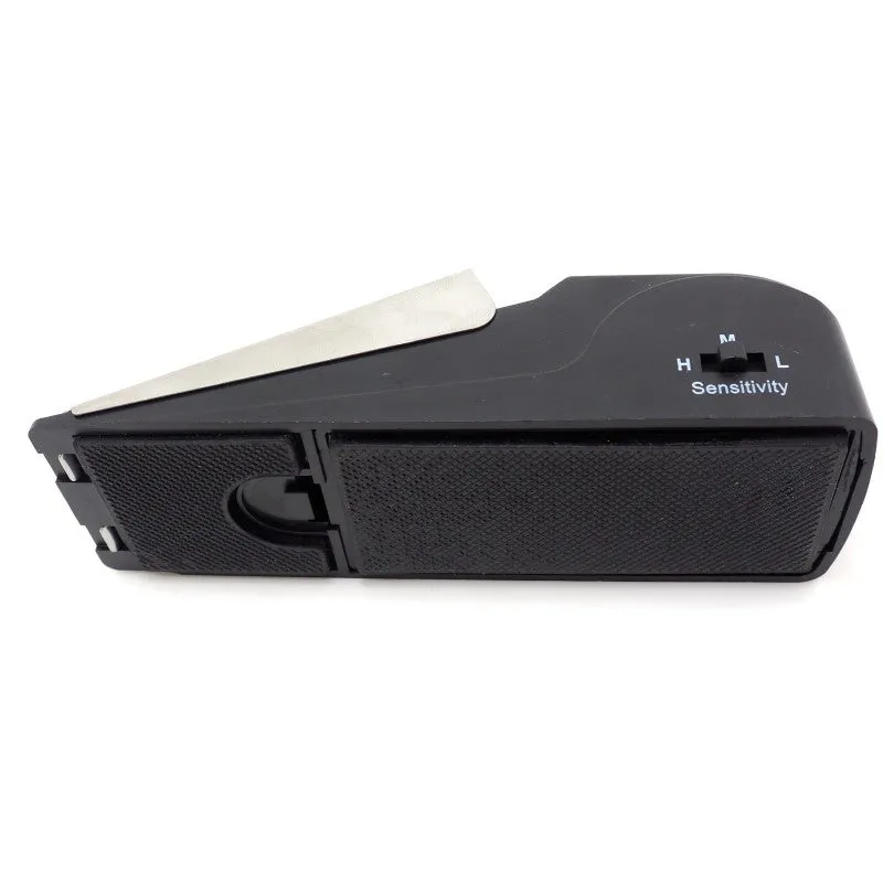 Black 120dB door stop alarm with stainless steel cover and wedge shape, measuring 14cm long