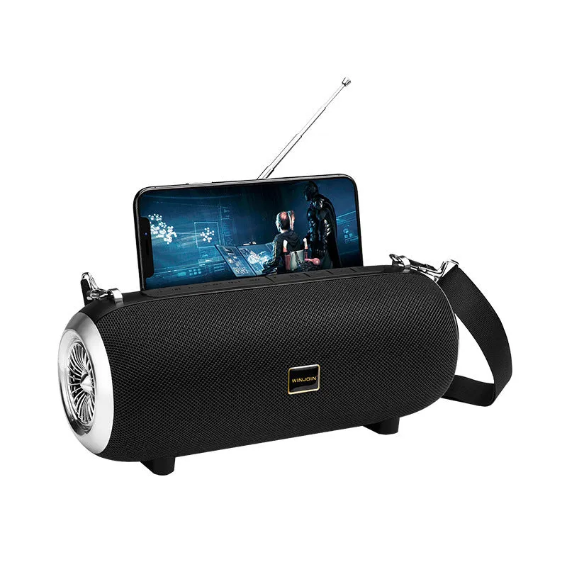 F666 square portable Bluetooth speaker with shoulder strap, phone stand, and retractable FM antenna.