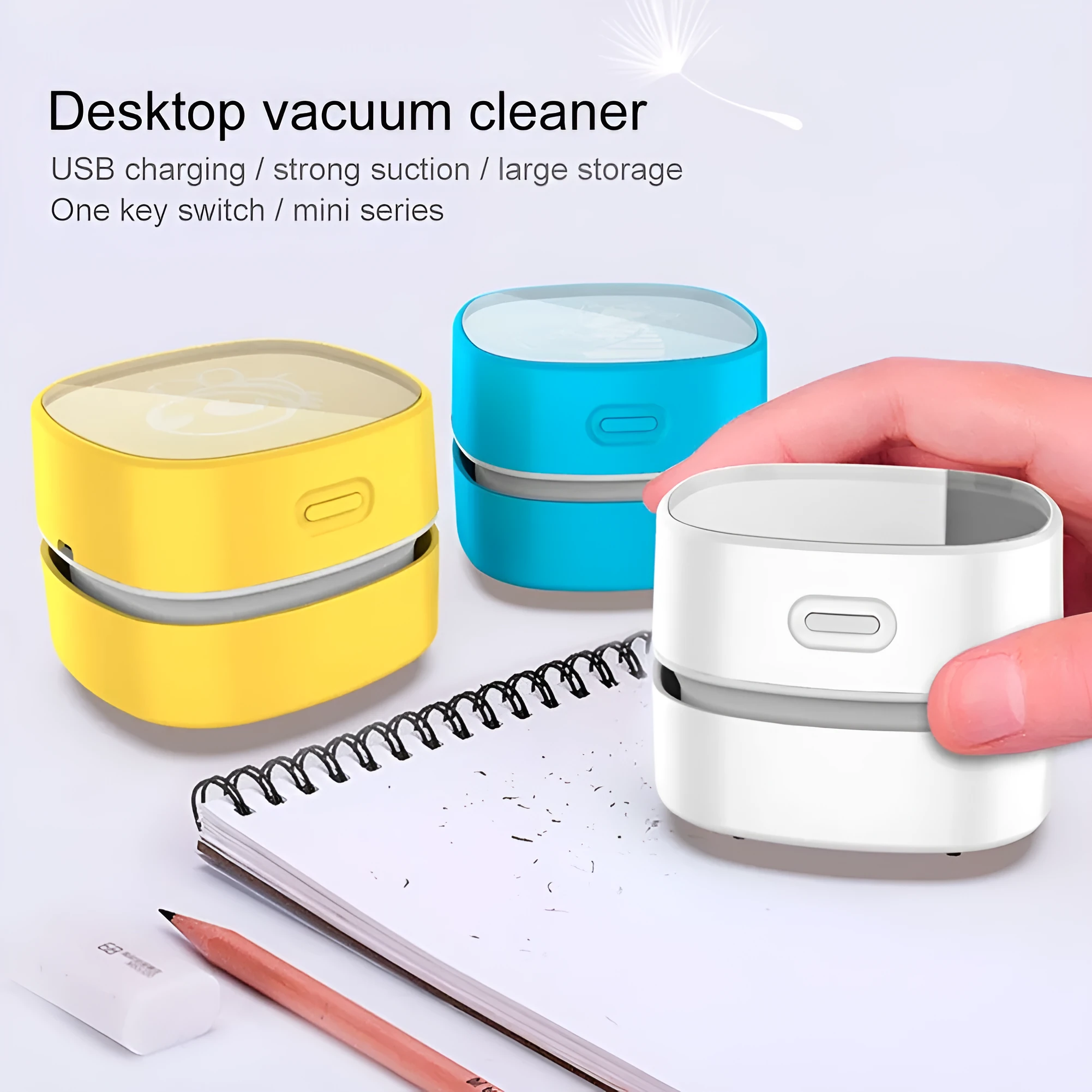 Portable handheld rechargeable mini vacuum cleaner in blue with suction nozzle on a white background