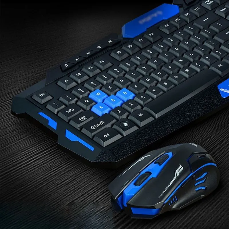 Black wireless keyboard and mouse set with blue accents on a desk