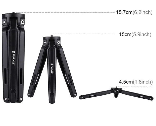 Metal mini tripod with non-slip rubber feet, 15cm max height, black, on uneven outdoor surface