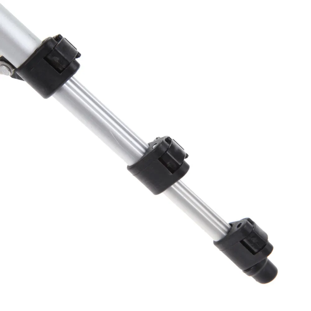 White aluminium alloy compact portable camera tripod with 4-section legs and PTZ set, folded for travel