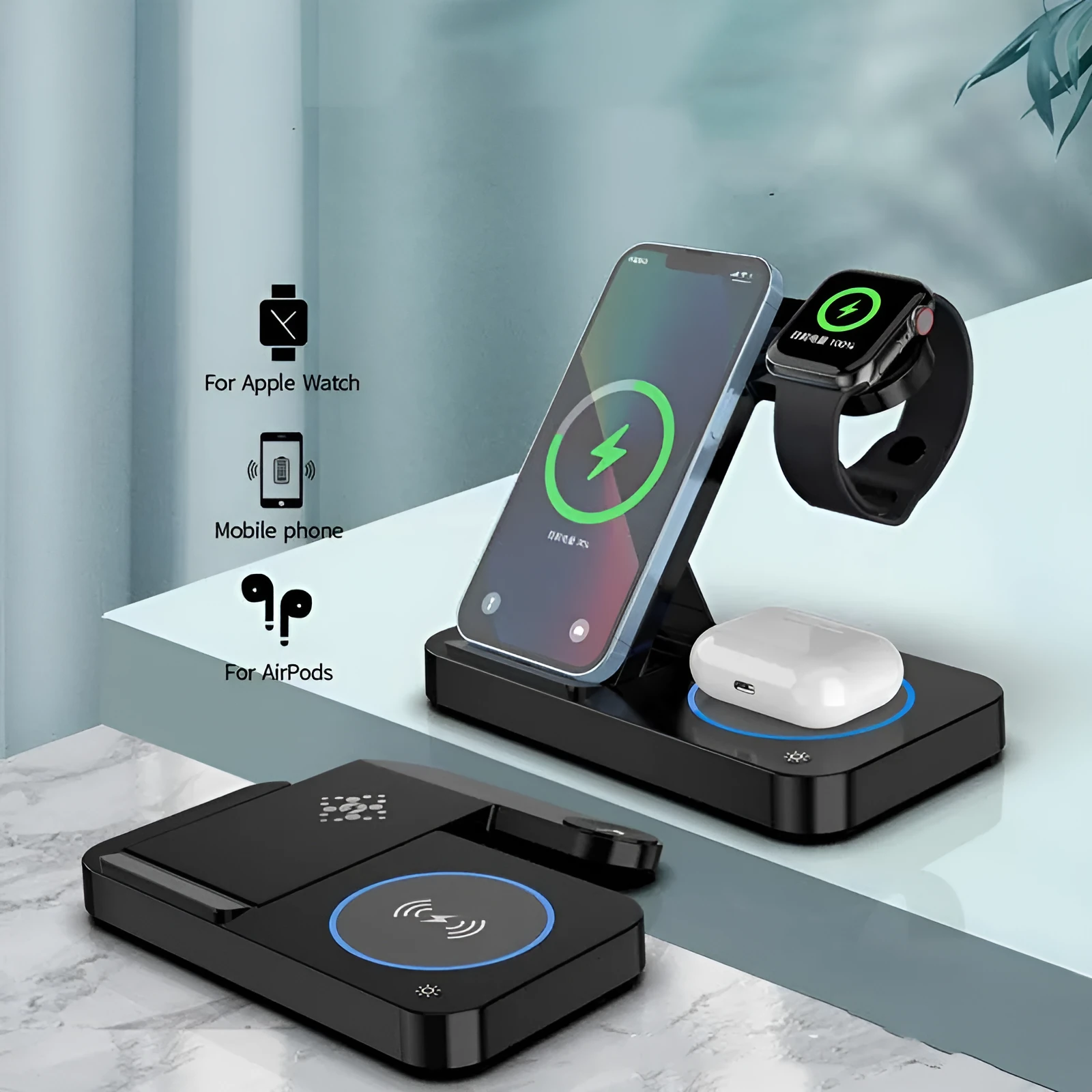 Folding three-in-one wireless charging stand in black, with phone, headphones and watch on charging pads