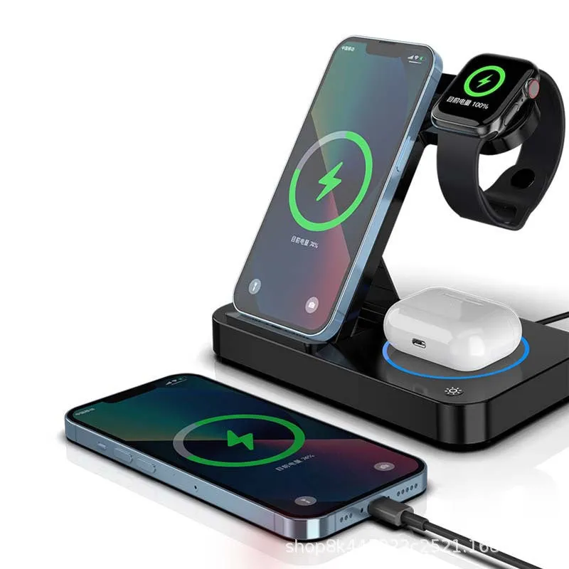 Folding three-in-one wireless charging stand in black, with phone, headphones and watch on charging pads