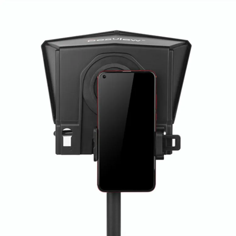 Portable small black cell phone teleprompter with adapter rings and remote control on a table
