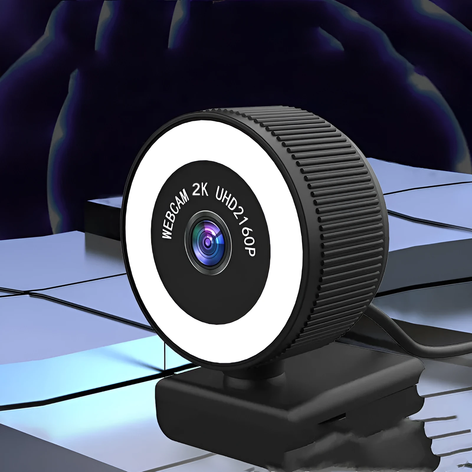 USB webcam 1080p 2K HD camera with built-in microphone and privacy cover on a desktop setup