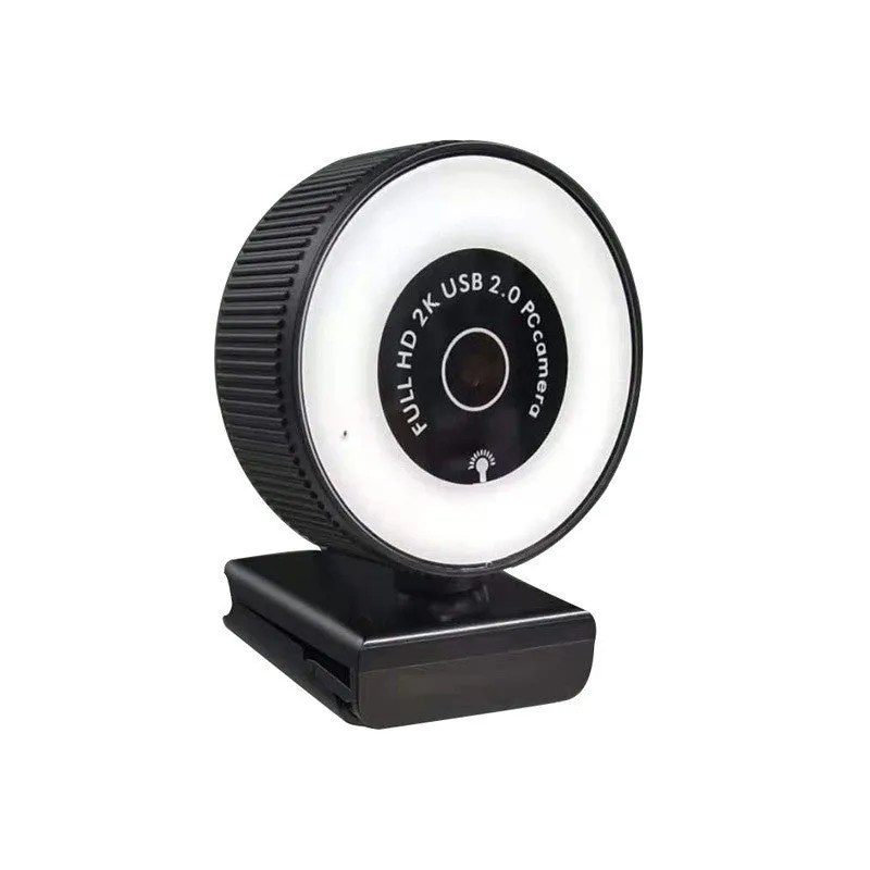 USB webcam 1080p 2K HD camera with built-in microphone and privacy cover on a desktop setup