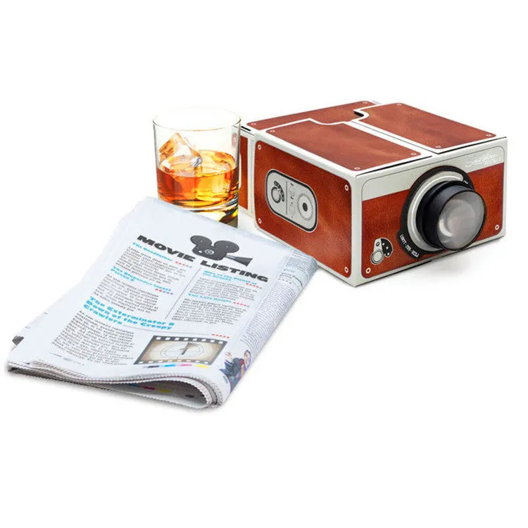 Portable DIY smartphone projector with zoom lens and smartphone insert slot, 8x magnification for home theatre use