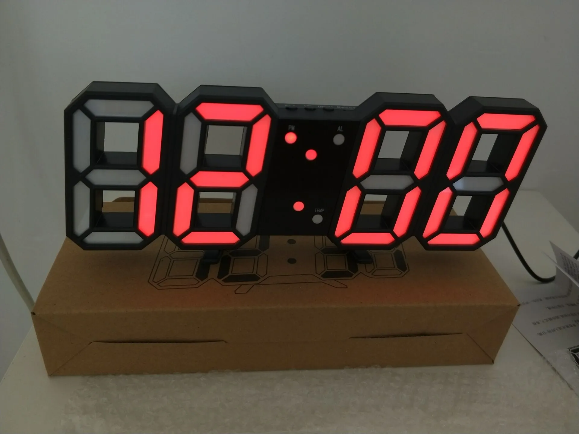 3D luminous LED digital wall clock with USB power, white plastic body, simple design