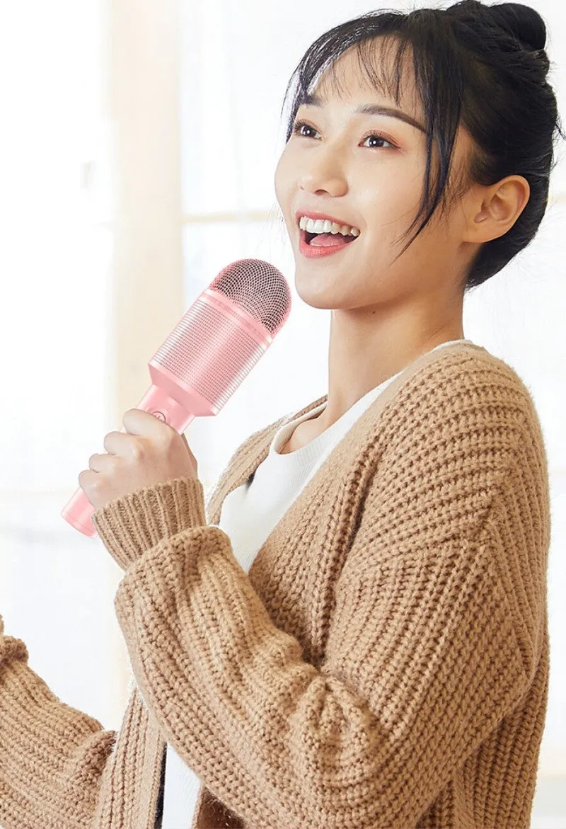 Wireless Bluetooth karaoke microphone in pink, blue, and green colour options.