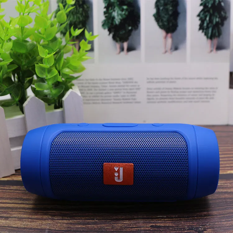 Waterproof Bluetooth speaker in black with USB charging port and control buttons