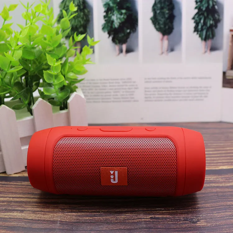 Waterproof Bluetooth speaker in black with USB charging port and control buttons