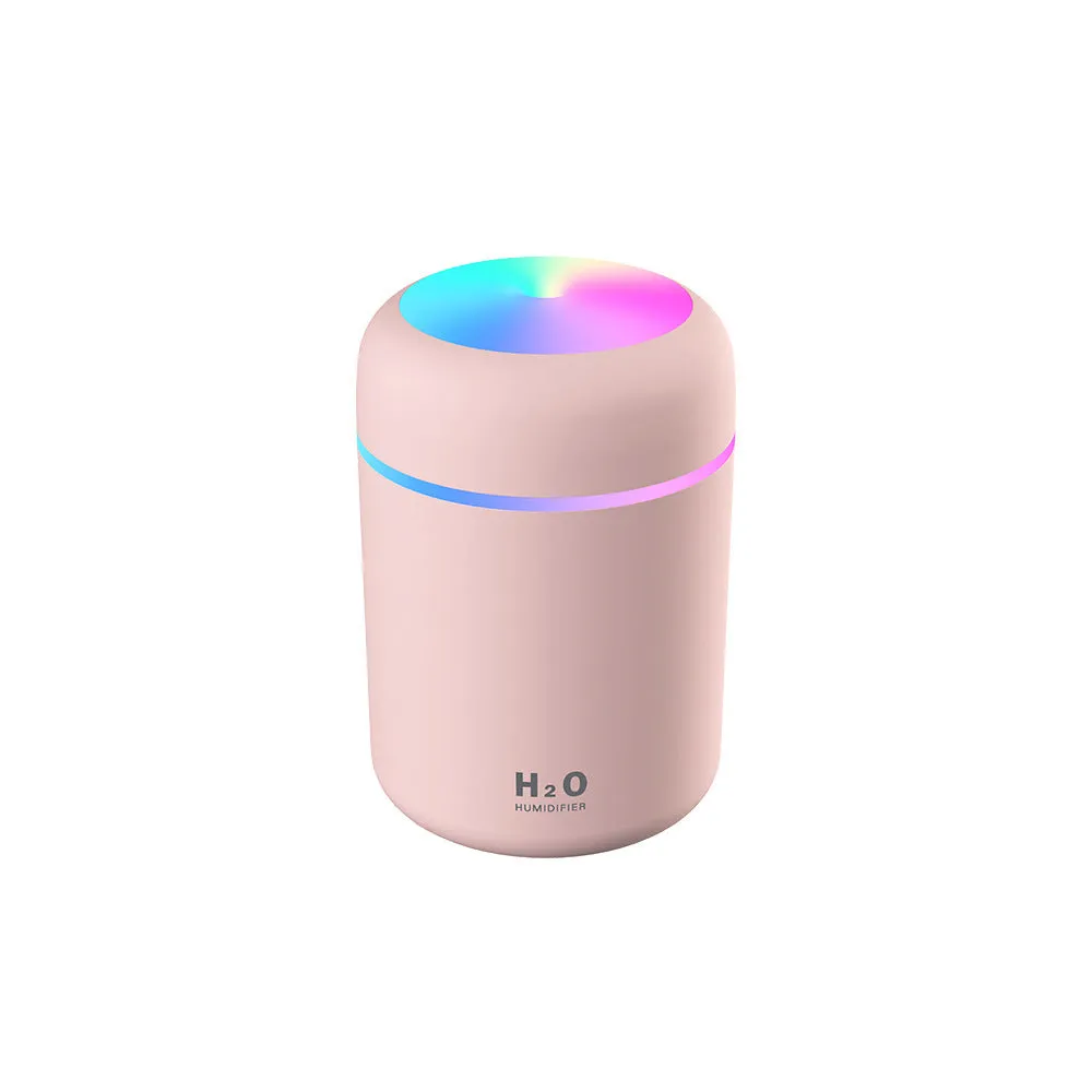 Black 300ml mini cool mist humidifier with multicolor LED night light on a desk