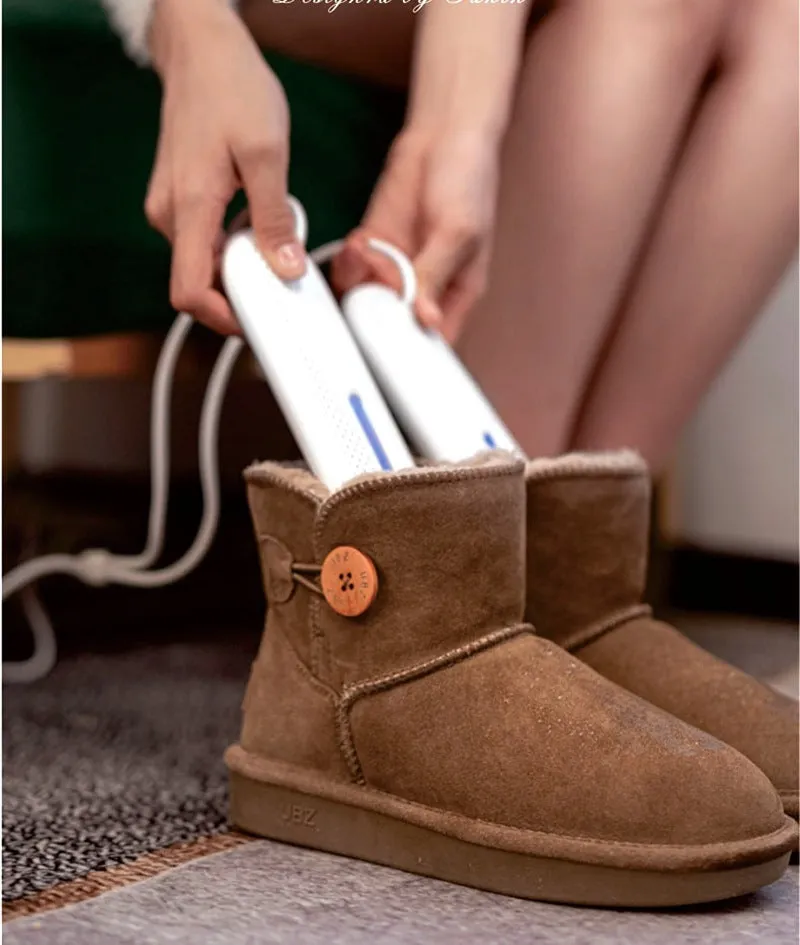 White USB shoe dryer with 360-degree three-dimensional drying for winter footwear
