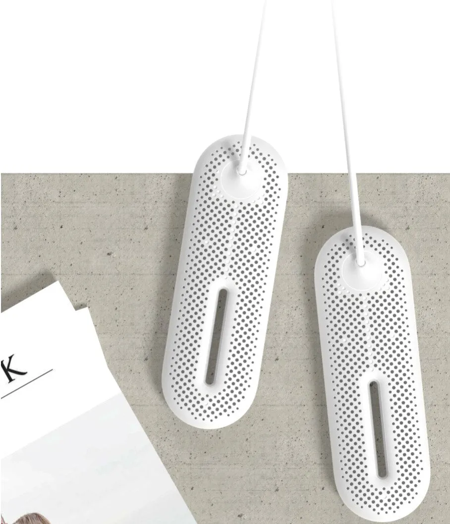 White USB shoe dryer with 360-degree three-dimensional drying for winter footwear