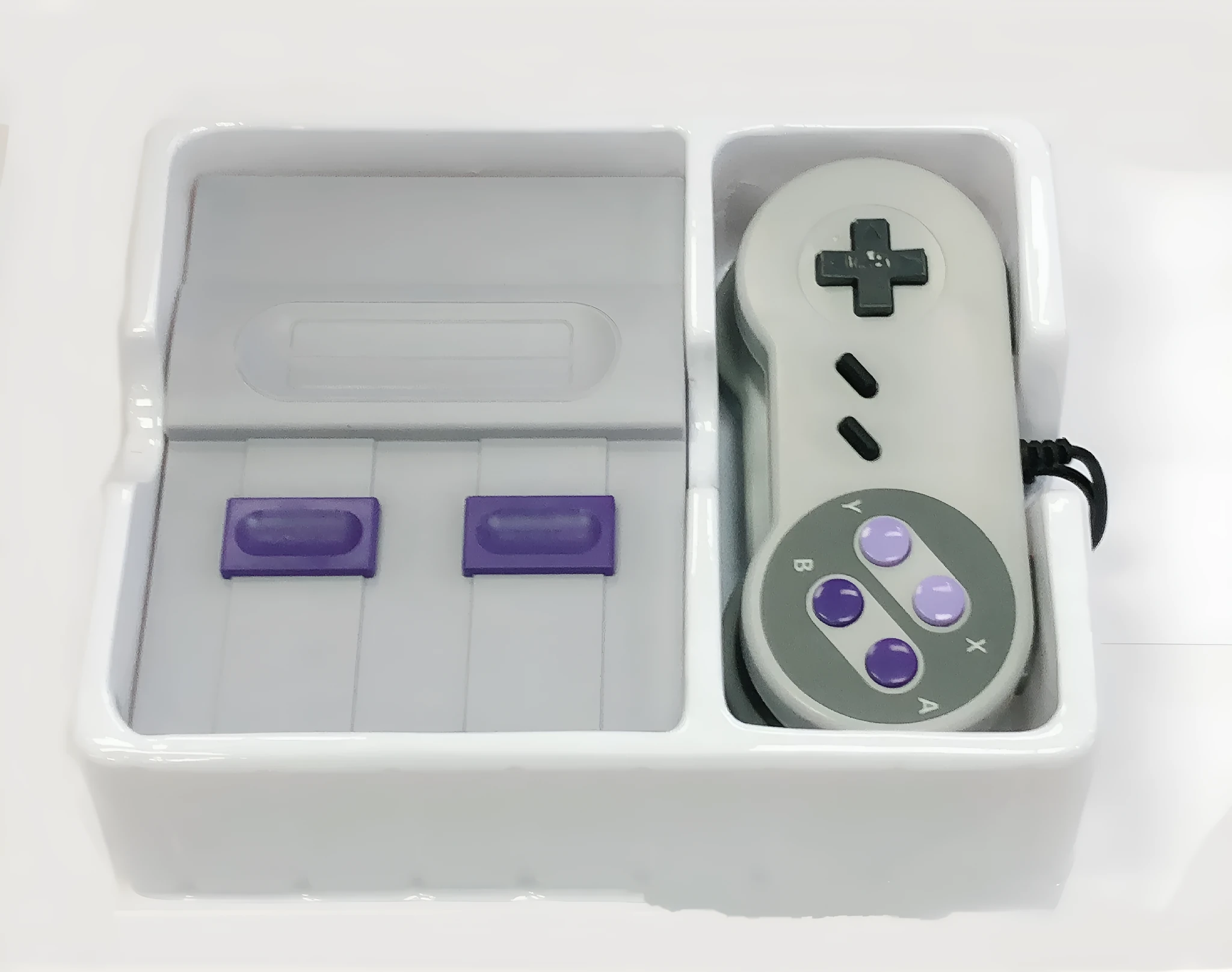 FC Red And White Classic TV Game Console SFC HD 821 in grey with two wired controllers on a table
