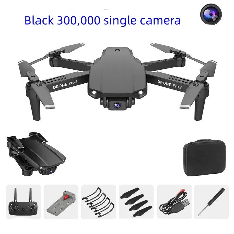 E99Pro2 folding dual camera drone black with propellers on table