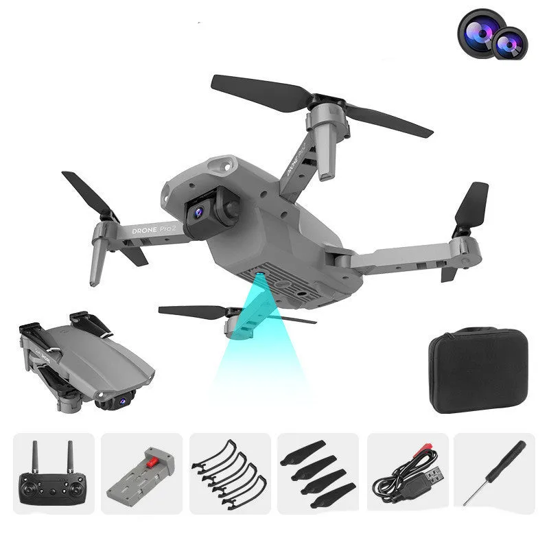 E99Pro2 folding dual camera drone black with propellers on table