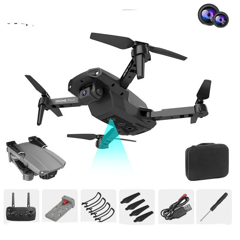 E99Pro2 folding dual camera drone black with propellers on table