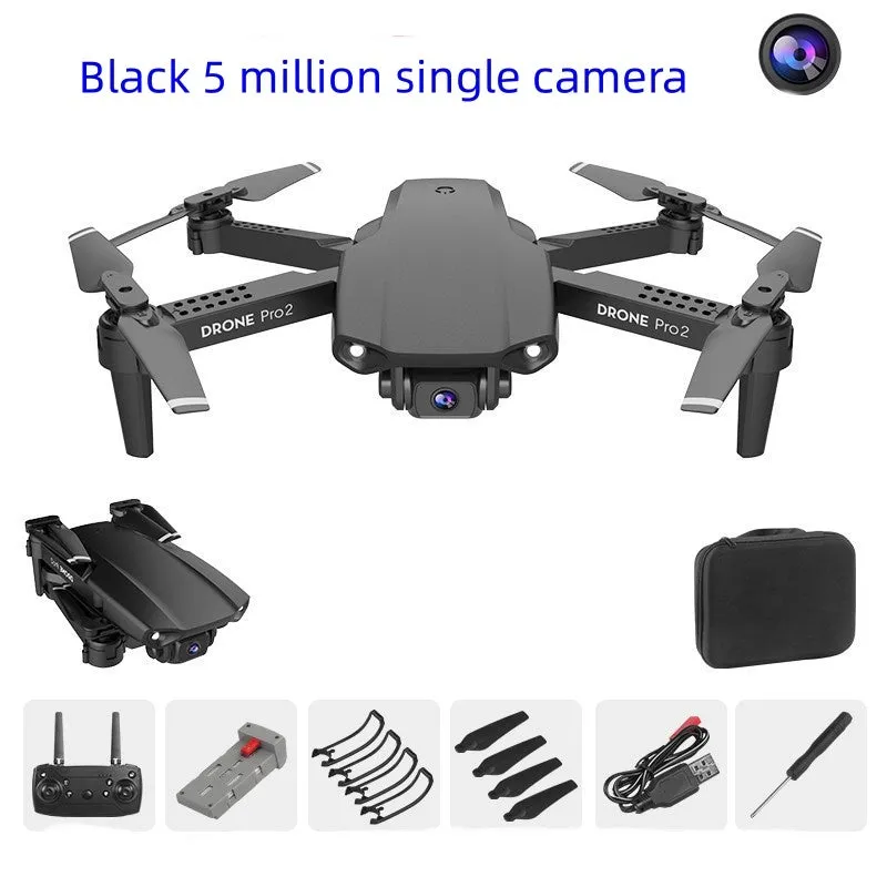 E99Pro2 folding dual camera drone black with propellers on table