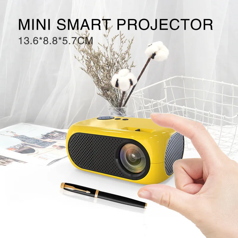 M24 portable mini LED projector in gold or white, showing compact size and included accessories.