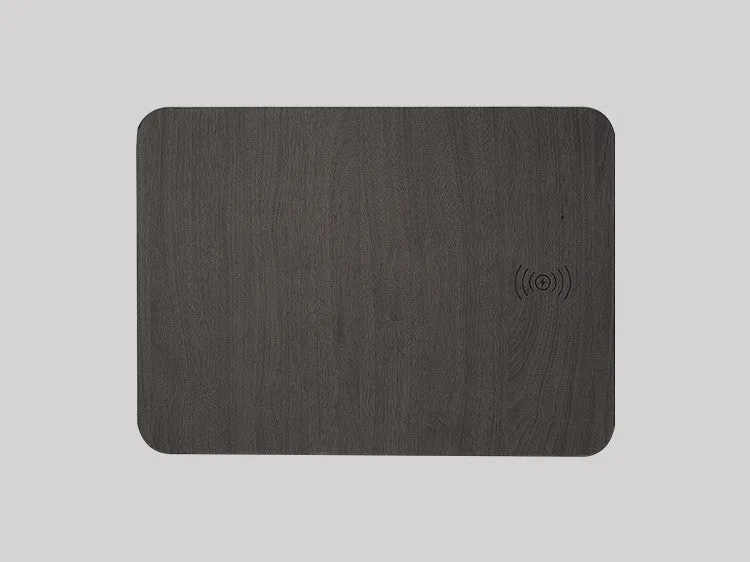 Wooden wireless charger with PU leather surface in brown finish on a desk
