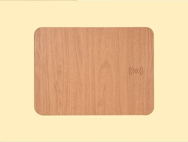 Wooden wireless charger with PU leather surface in brown finish on a desk