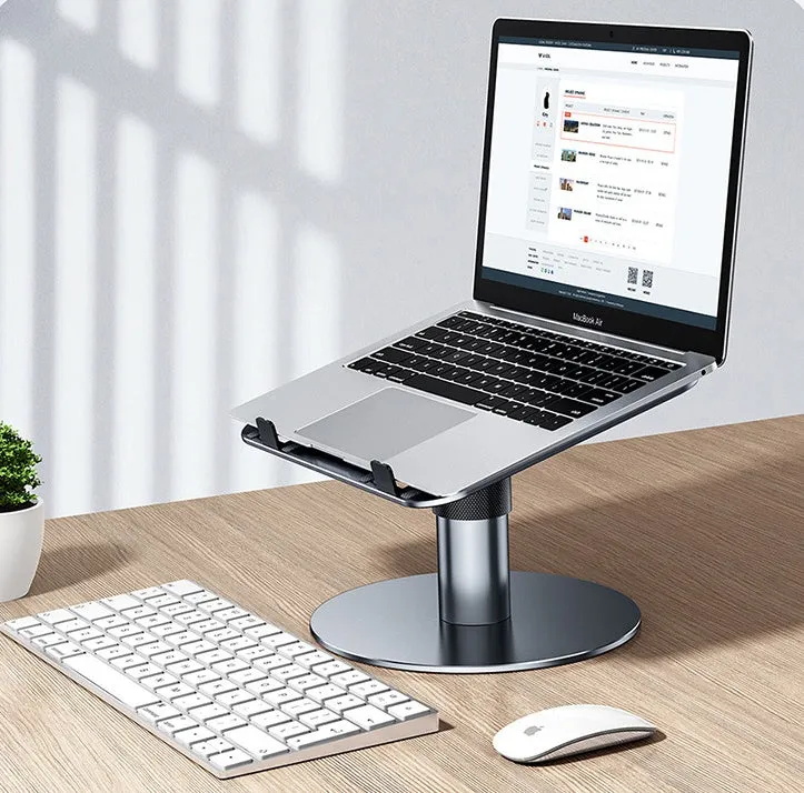Silver aluminium laptop stand at adjustable height with rotating base and non-slip pads