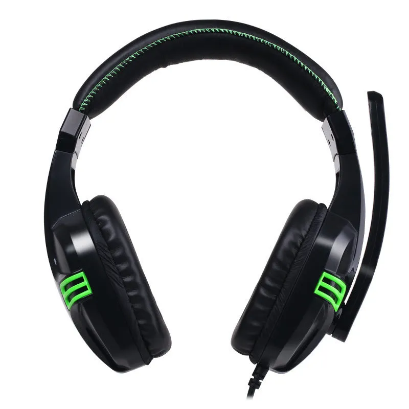 Black wired gaming headset with microphone placed on a desk, 3.5mm plug visible