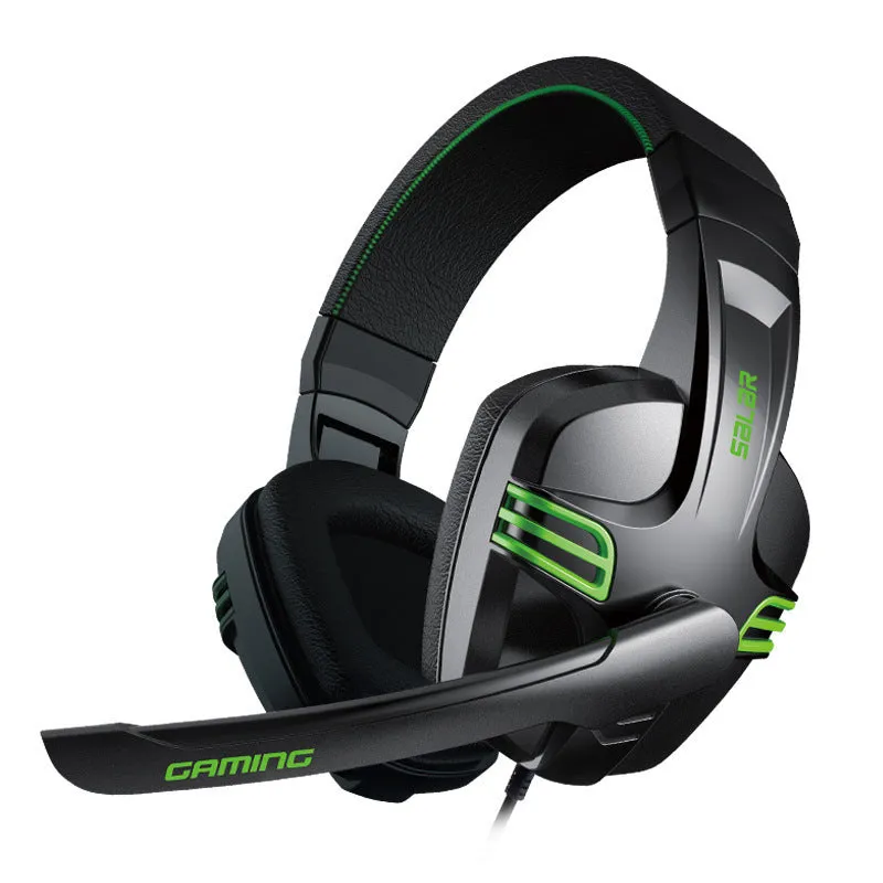 Black wired gaming headset with microphone placed on a desk, 3.5mm plug visible
