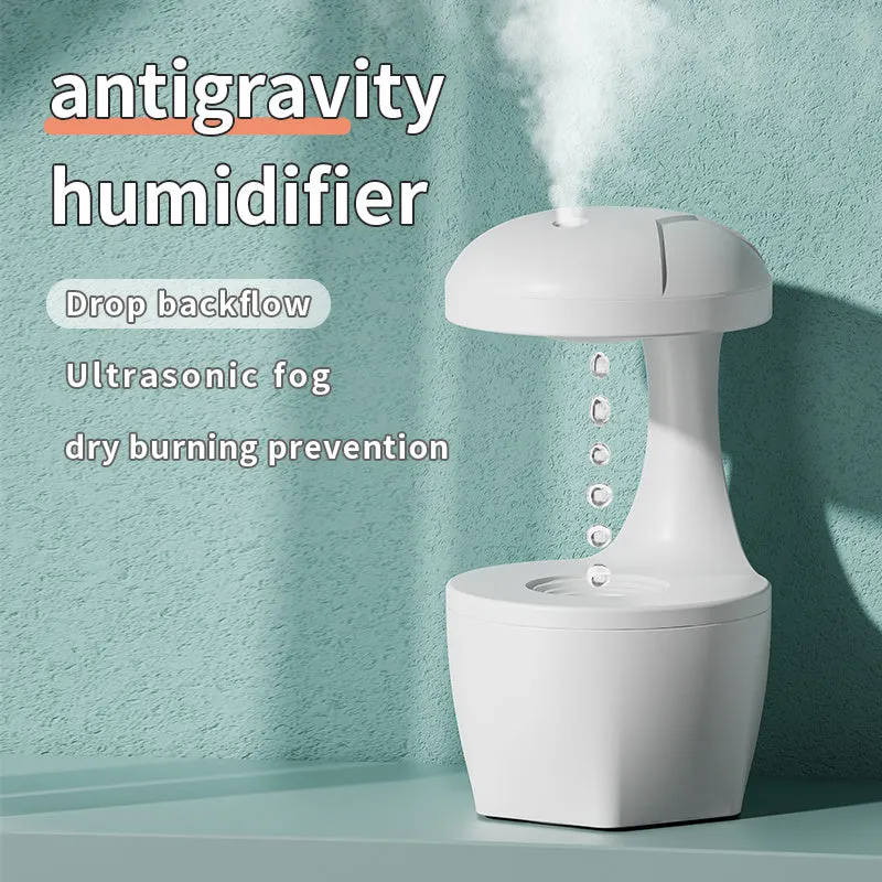 White portable 800ml cool mist USB humidifier with anti-gravity droplet design and aromatherapy for bedroom