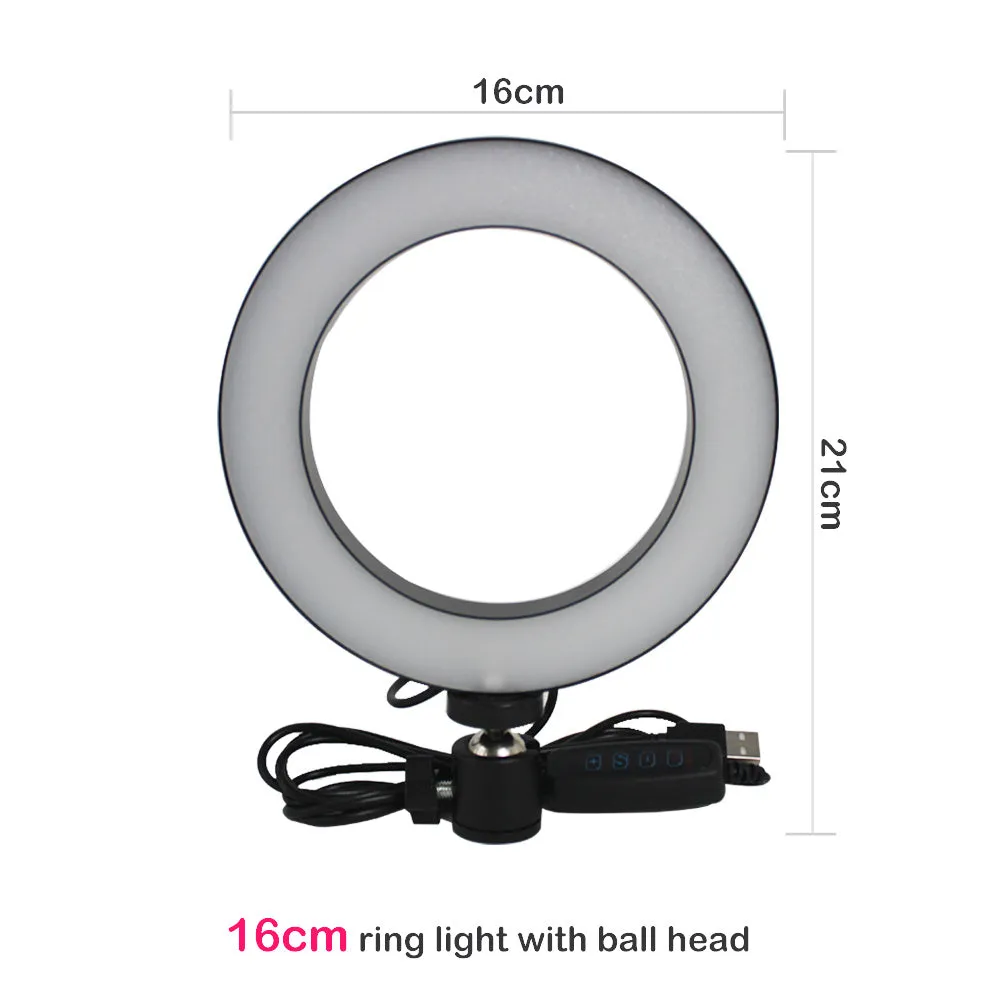 26cm RGB ring light set with tripod, selfie stick, and Bluetooth remote on a desk