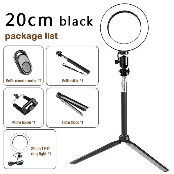 26cm RGB ring light set with tripod, selfie stick, and Bluetooth remote on a desk