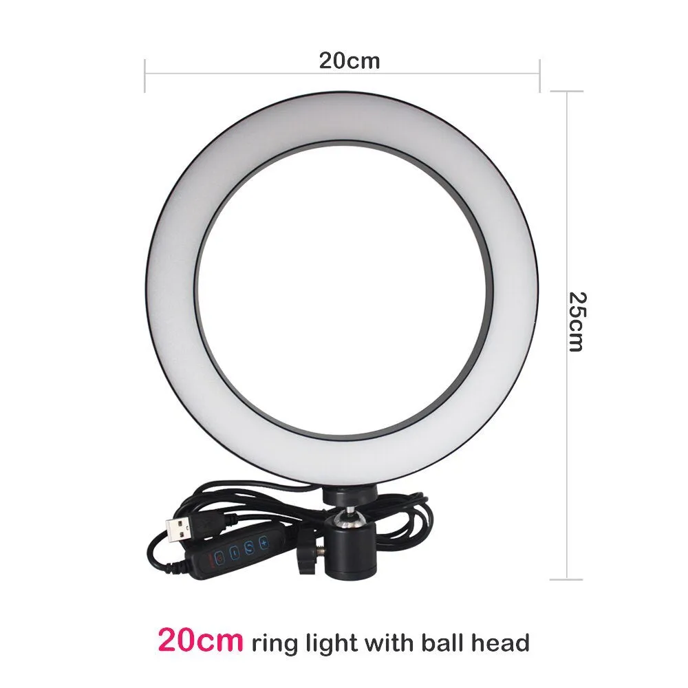 26cm RGB ring light set with tripod, selfie stick, and Bluetooth remote on a desk