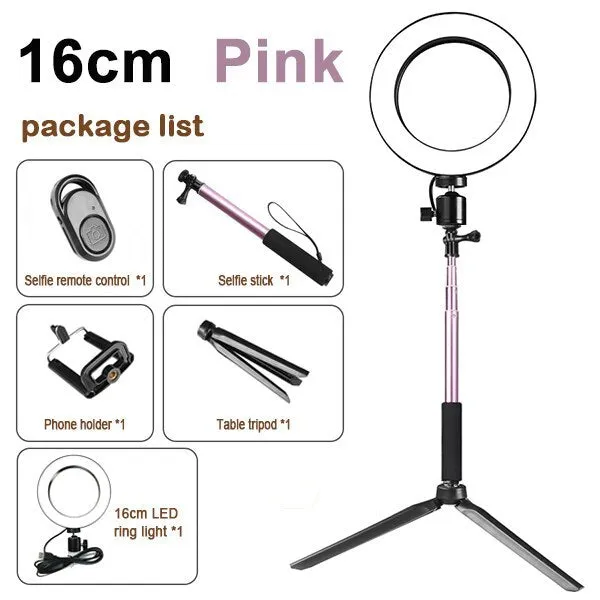 26cm RGB ring light set with tripod, selfie stick, and Bluetooth remote on a desk
