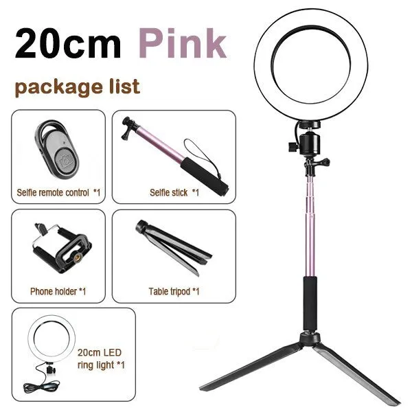 26cm RGB ring light set with tripod, selfie stick, and Bluetooth remote on a desk