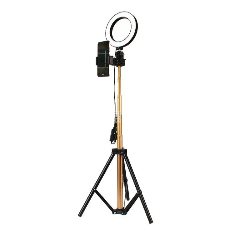 26cm RGB ring light set with tripod, selfie stick, and Bluetooth remote on a desk