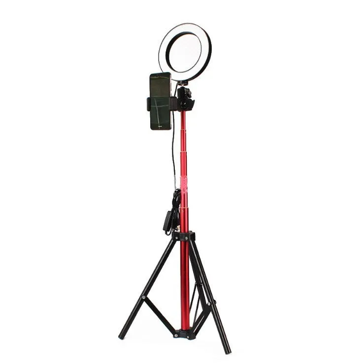 26cm RGB ring light set with tripod, selfie stick, and Bluetooth remote on a desk