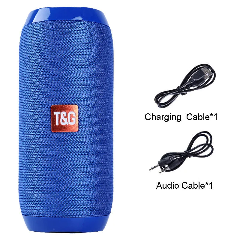 Black portable IPX5 waterproof Bluetooth speaker with mesh grille on a rocky outdoor surface