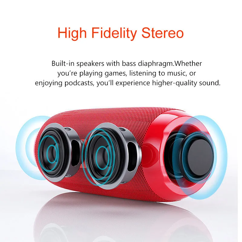 Black portable IPX5 waterproof Bluetooth speaker with mesh grille on a rocky outdoor surface