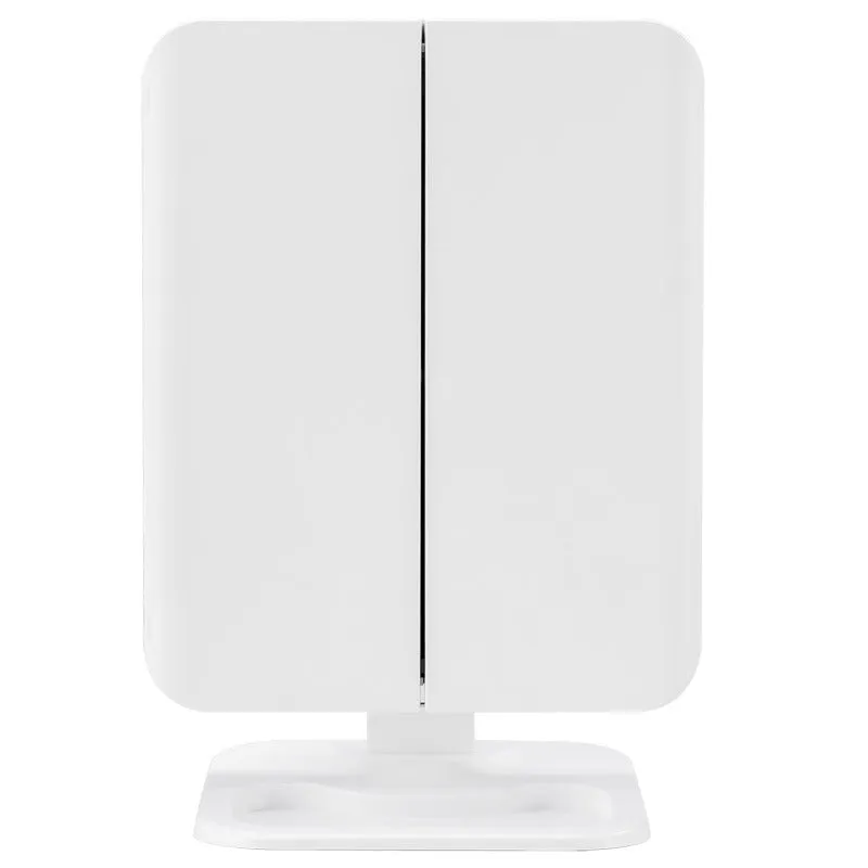 Trifold LED makeup mirror with 68 lights, 10X detachable magnifier, silver surface, rotating 180 degrees on a tabletop