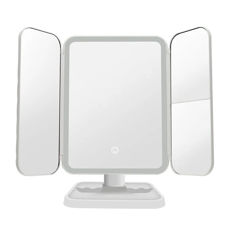 Trifold LED makeup mirror with 68 lights, 10X detachable magnifier, silver surface, rotating 180 degrees on a tabletop