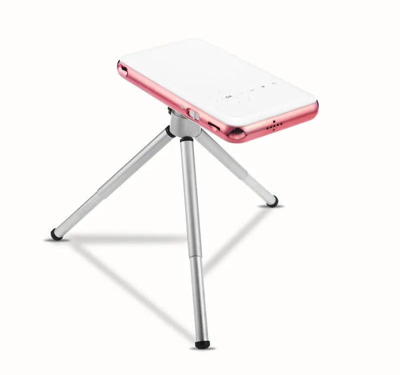 White and rose gold M6S miniature portable Android DLP smart projector on a table.