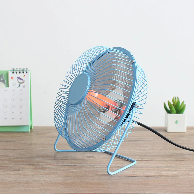 Bakingl Little Sun 4 inch black electric fan heater on a desk with quiet energy-saving operation