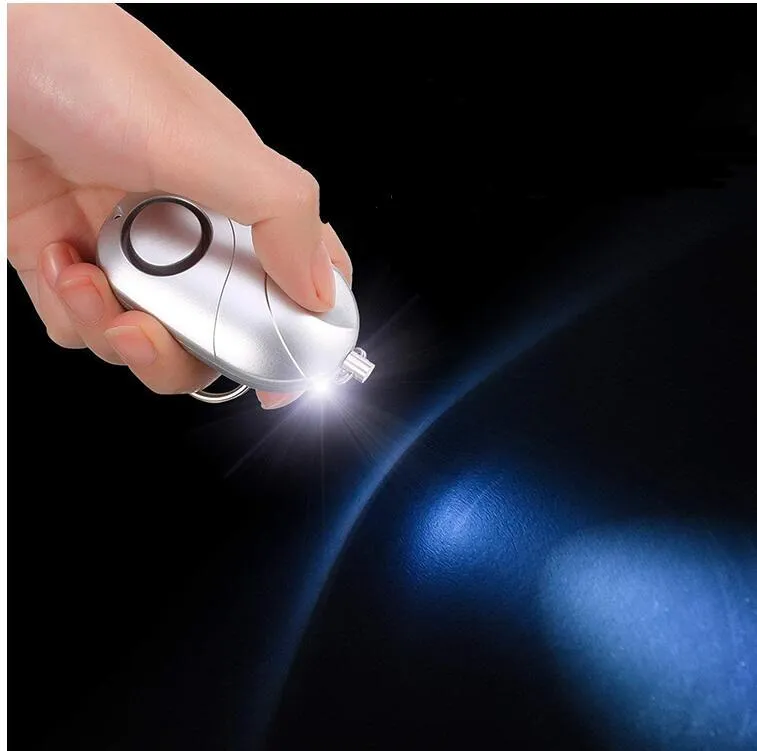 Personal alarm keychain with 130dB sound and LED flashlight in pink colour